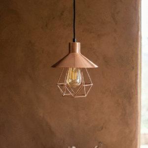 Modern decorative pendant light with warm glow, minimalist design, and glass shade hanging against a textured wall