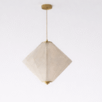 Modern pendant light in double height hall interior with warm ambient lighting