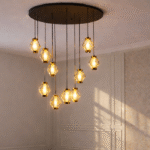 “Modern chandelier lighting in a warm brown-toned living room interior at night”