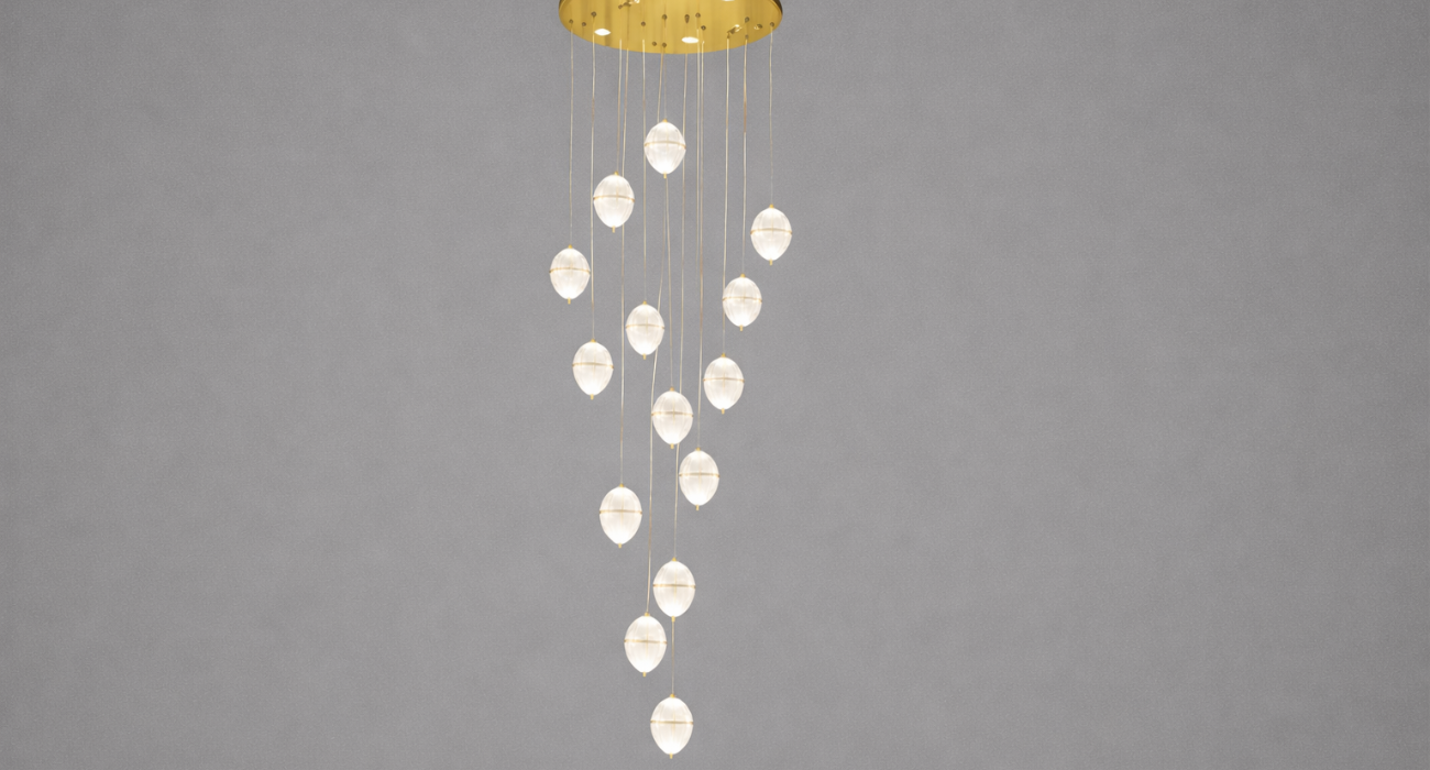 Elegant cascading chandelier lighting in a modern double height living room with gold ceiling plate and crystal pendant drops.